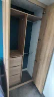Small Natural Pacific Walnut wardrobe with drawers and hanging interior, installed in Sunderland